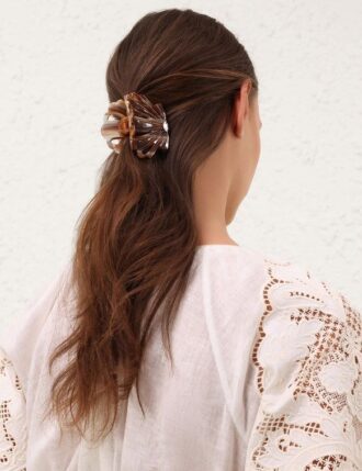 Fermaglio a conchiglia color cuoio online