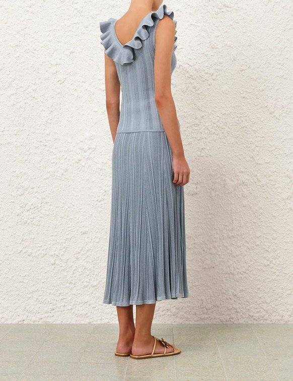 Top con volant metallizzati Aster in blu metallizzato online Top con volant metallizzati Aster in blu metallizzato online