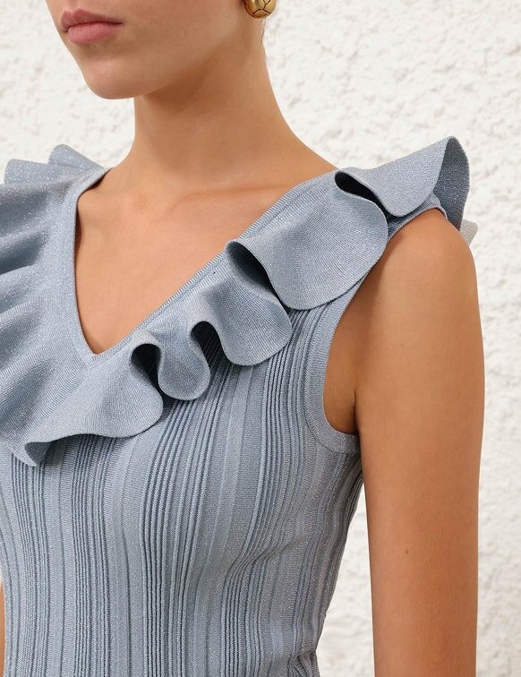 Top con volant metallizzati Aster in blu metallizzato online Top con volant metallizzati Aster in blu metallizzato online