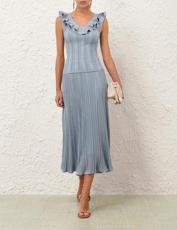 Top con volant metallizzati Aster in blu metallizzato online Top con volant metallizzati Aster in blu metallizzato online